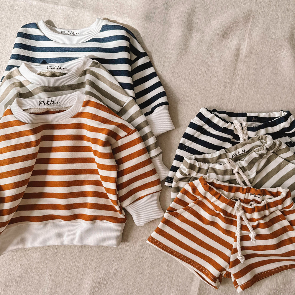 
                      
                        Cotton sweater / burnt orange stripes
                      
                    