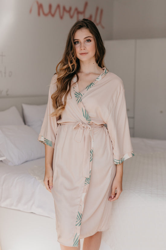 Blush robe with floral emerald trim