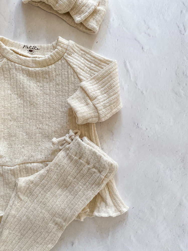
                      
                        Girls ruffle dress / cotton knit
                      
                    
