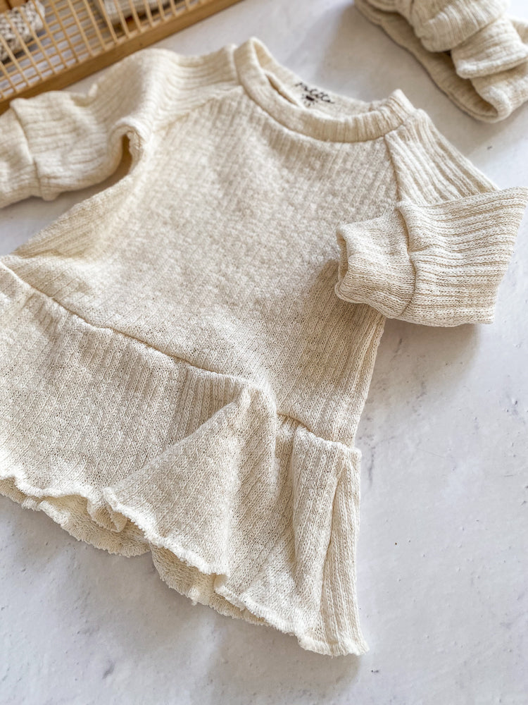 
                      
                        Girls ruffle dress / cotton knit
                      
                    