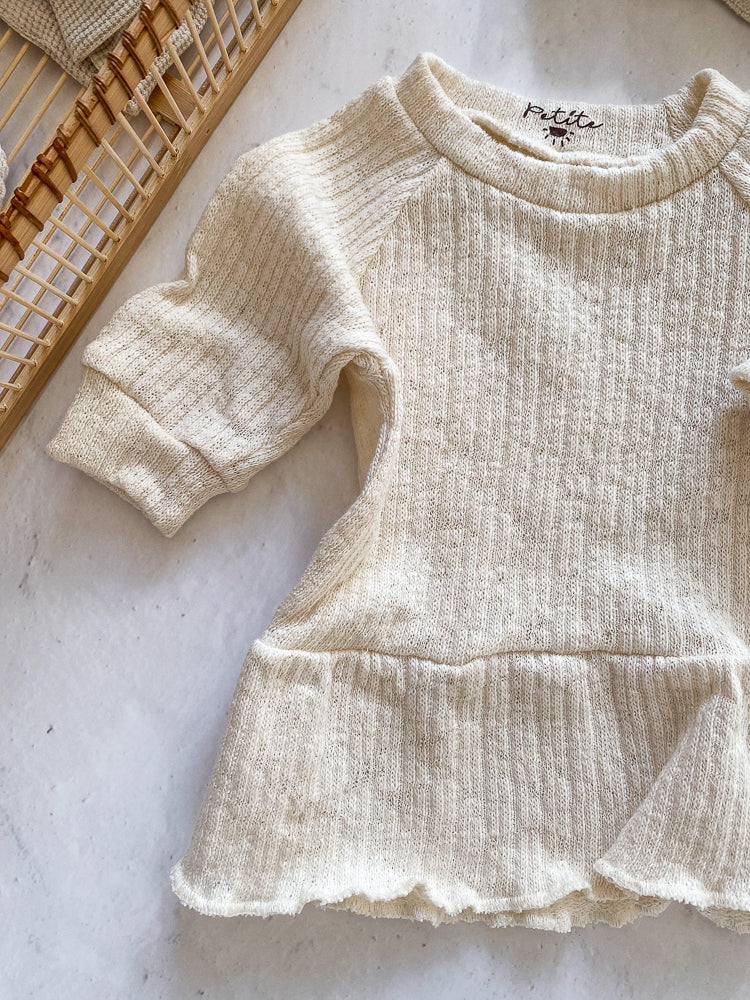 
                      
                        Girls ruffle dress / cotton knit
                      
                    