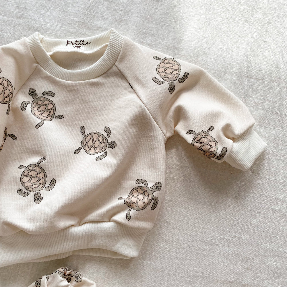 
                      
                        Baby cotton sweatshirt / turtles
                      
                    
