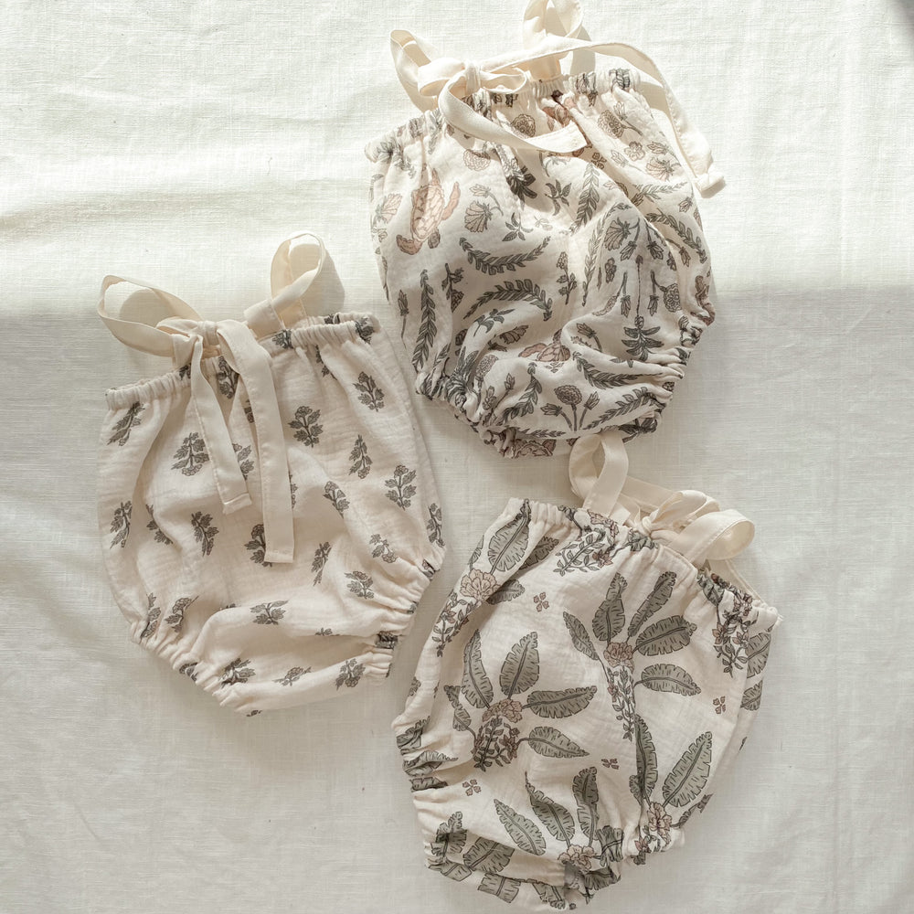 
                      
                        Muslin romper / florals
                      
                    