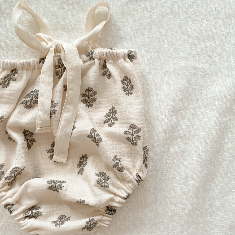 
                      
                        Muslin romper / florals
                      
                    